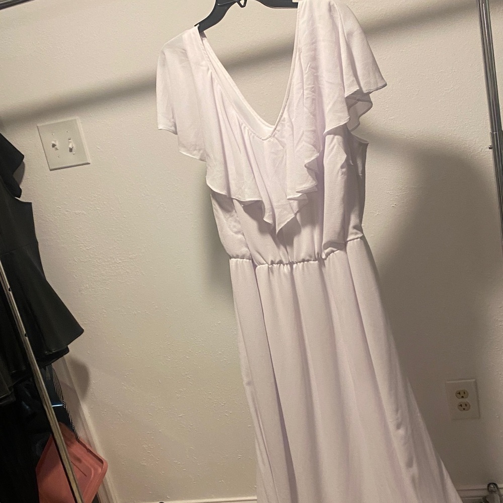 Kiyonna Porcelain White Maxi Dress with Ruffle Detail and skirt lining.